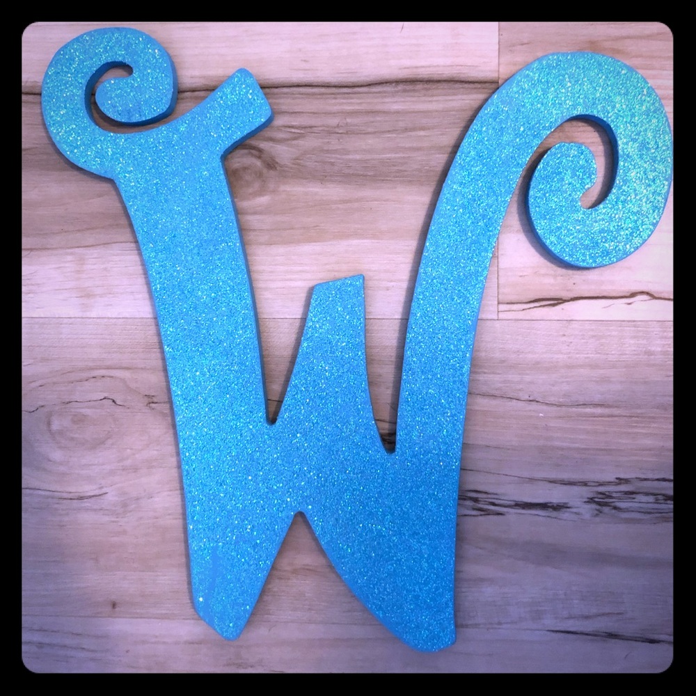 Aqua “W” sign